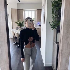 Tiger Mist Black Turtleneck Cut Out Black Top (Size XS)